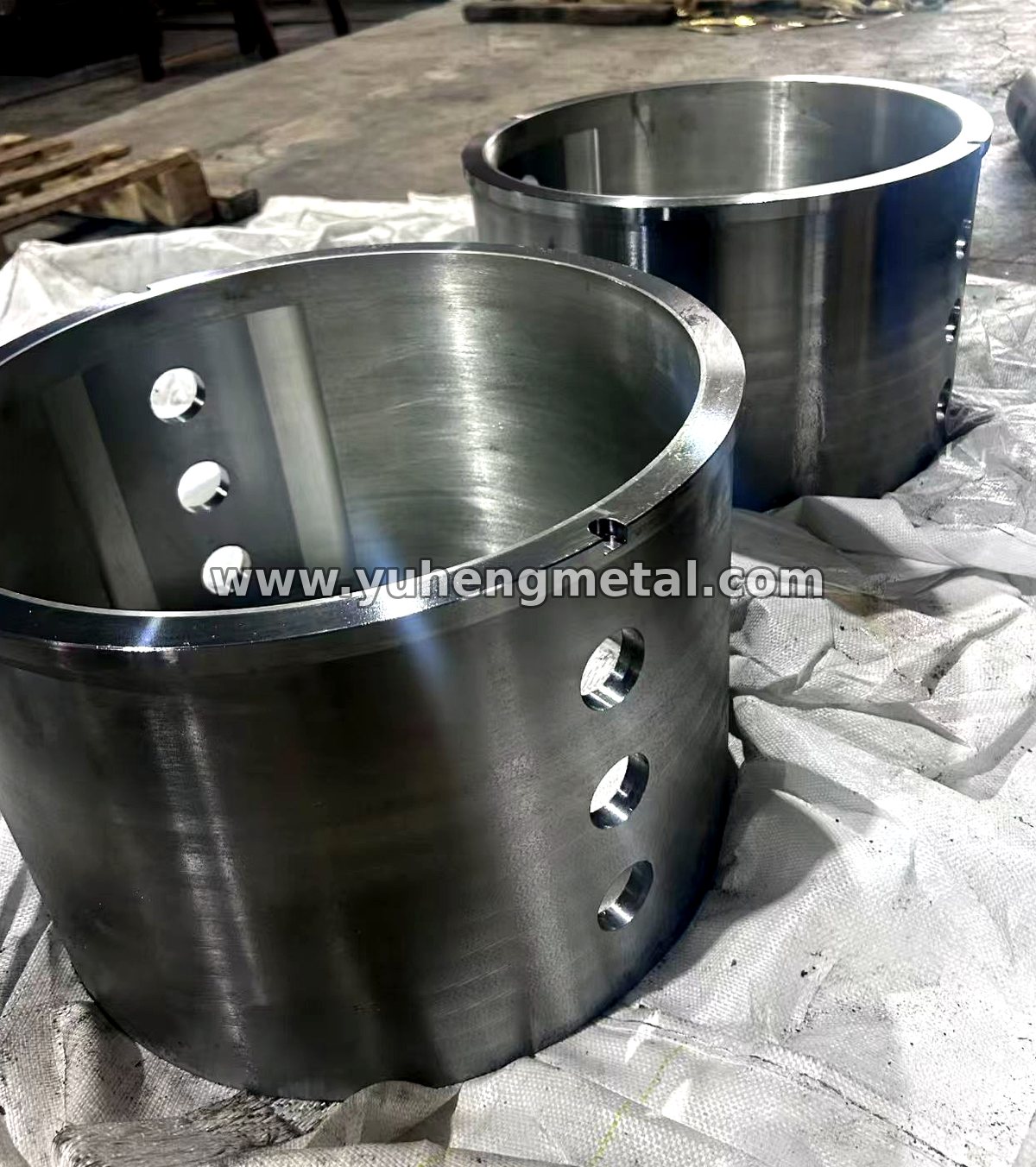 Babbitt-lined bearing shells with oil holes and keyways, finish-machined