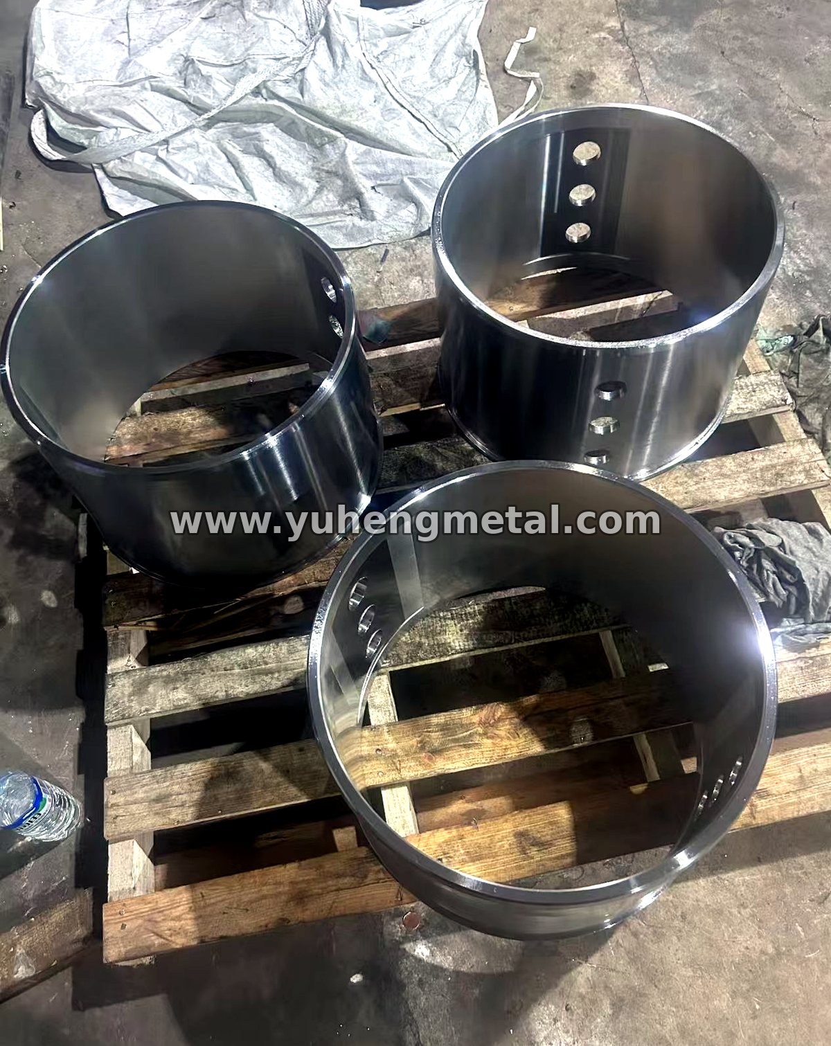 Babbitt bearing bushings on a pallet after machining