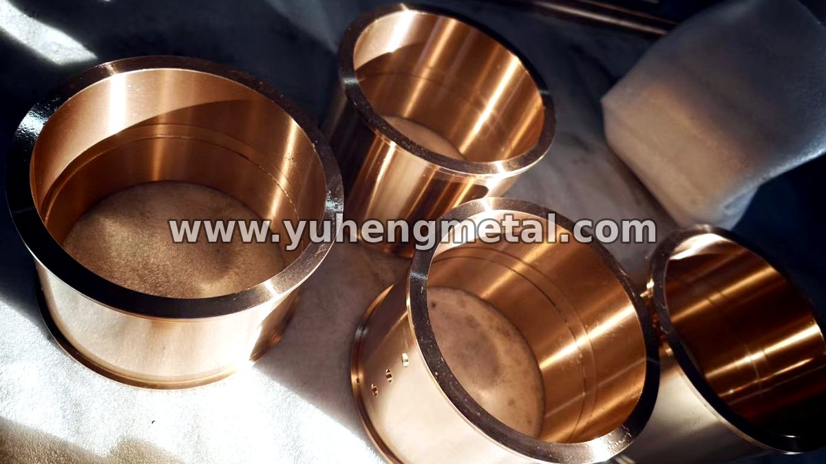 Copper alloy bushing with an internal oil groove, cast and machined to drawing