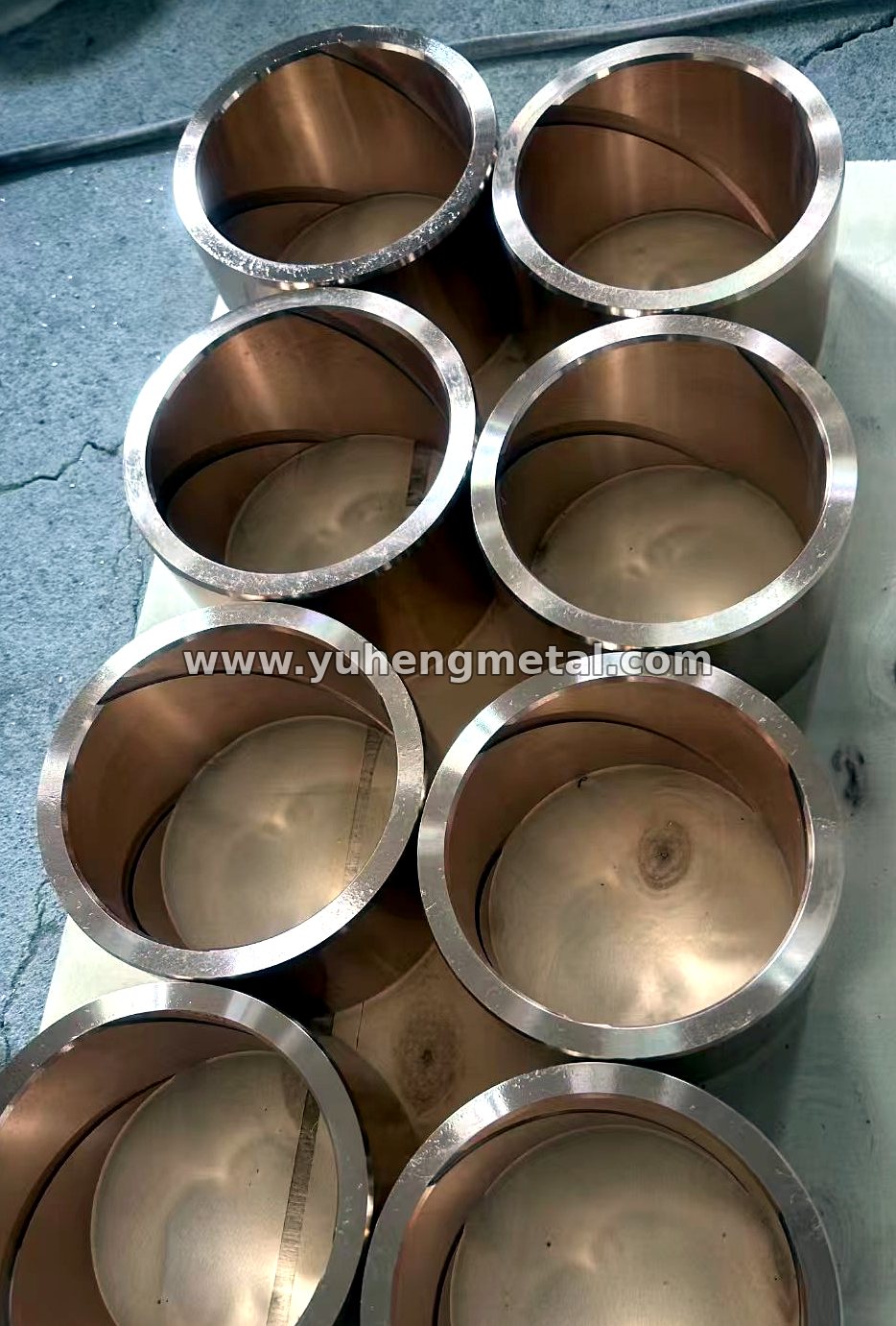 Copper alloy bushings in a range of sizes, machined and ready for despatch