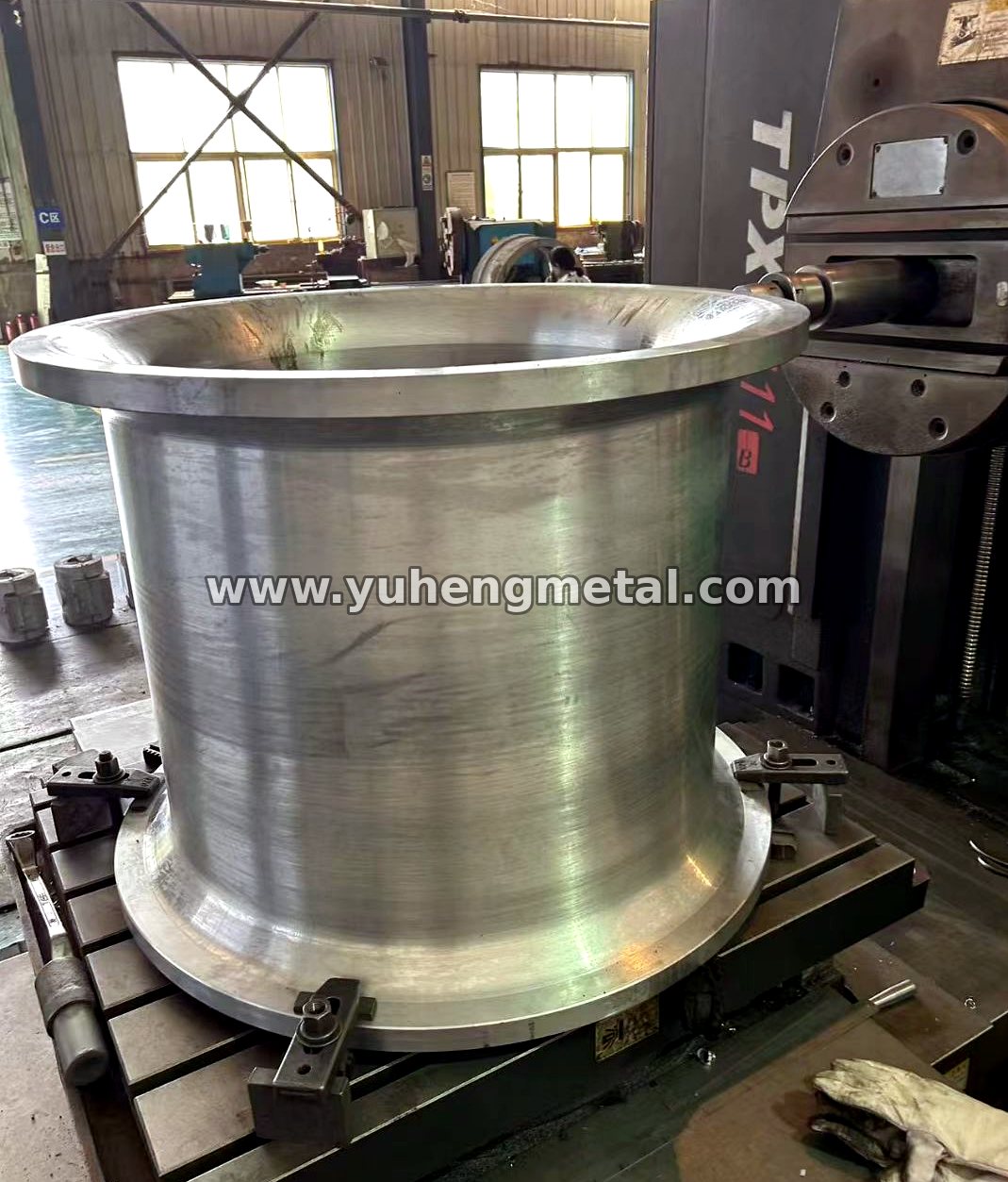 Trunnion bearing shell set up on a large boring machine for final machining