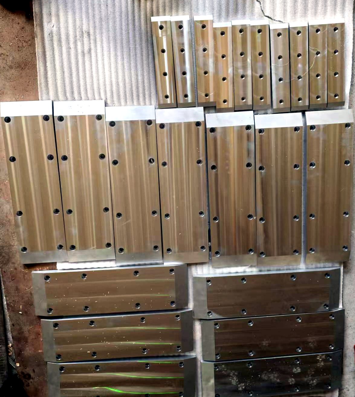 Machined zinc-aluminium alloy liner plates ready for despatch
