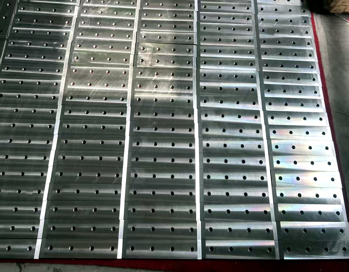 Batch of zinc alloy liner plates with drilled fixing holes